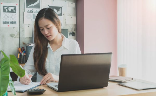 beautiful young asian girl working home office with laptop 11zon